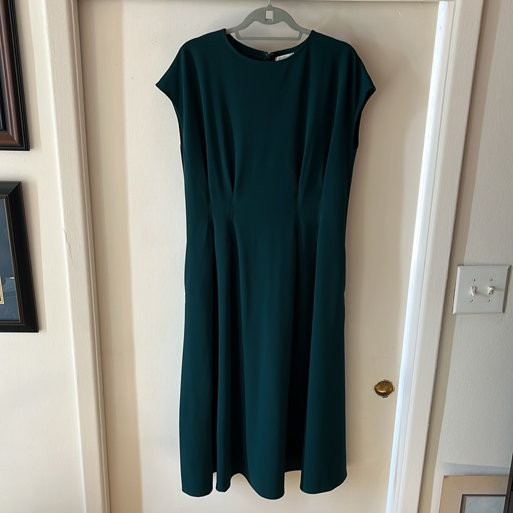 Teal green below the knee dress.
